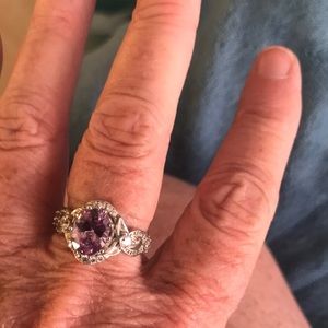 Silver ring with purple stone and crystals
